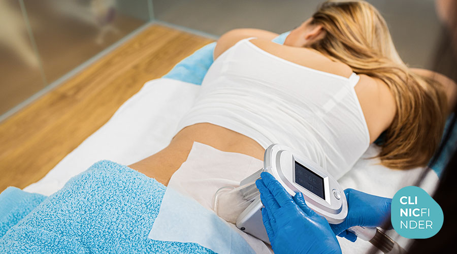 Patient lying down with two cooling applicators attached to the abdomen